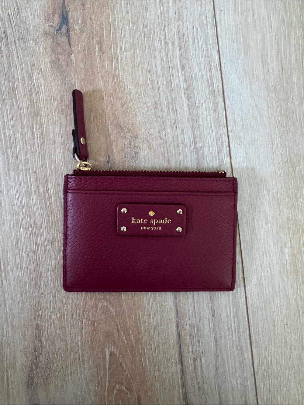 kate spade wine red leather zip card case with gold hardware